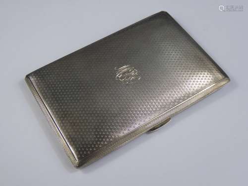 A Silver Engine-Turned Cigarette Case