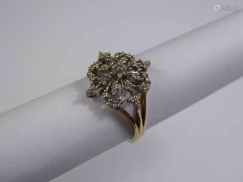 A 9ct Gold Yellow Gold and Diamond Ring