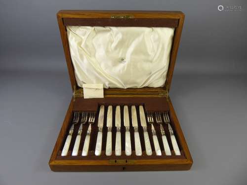 A Set of Mother of Pearl Handled Silver Plated Fruit Knives and Forks