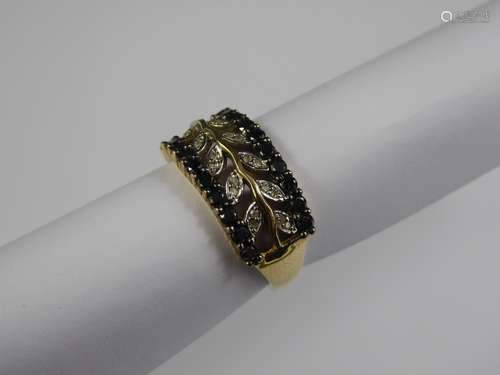 A 9ct Yellow Gold Black and White Diamond Ring Laurel Ring