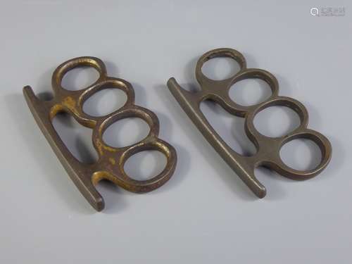 A Pair of Metal Knuckle-Dusters.