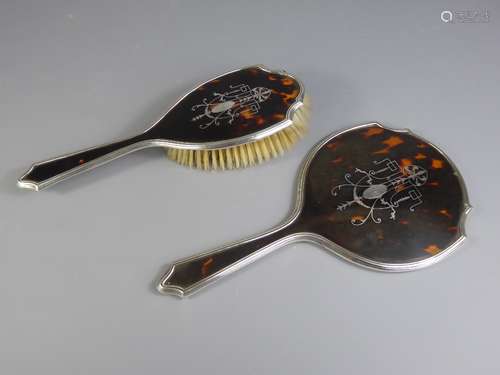 A Tortoise Shell and Silver Vanity Set