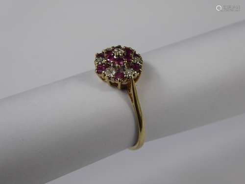 A 9ct Yellow Gold Ruby and Diamond Cluster Ring,