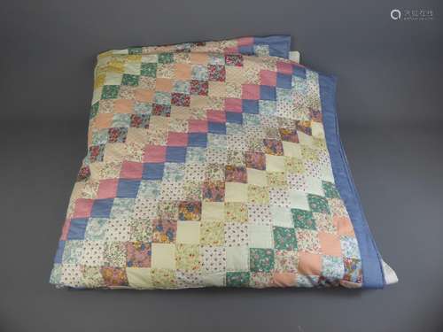 A Hand-Stitched Cotton Patchwork Quilt