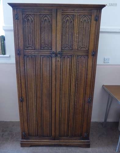 An Oak Gothic Arts & Crafts-Style Wardrobe