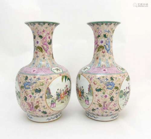 A pair of Chinese Famille Rose baluster vases, each having three panels acr