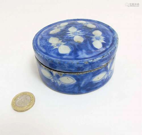 A Chinese blue and white circular lidded inkstone, 3 3/4'' diameter, 1 3/4'