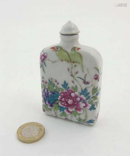 An Oriental porcelain Famille Rose rectangular snuff bottle, decorated with