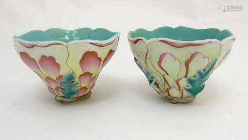 A pair of Chinese moulded flower cups formed as stylised peonies flowers ba