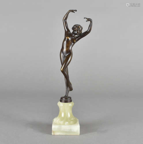 An art deco bronze figure, modelled as a dancing nude on onyx base stamped Vivian, 26 cm high