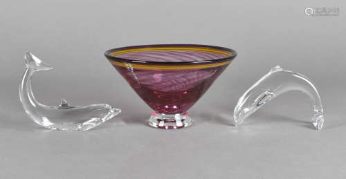 A pair of Baccarat dolphin figures, an art glass bowl by Peter Tobias, and a glass dish by G Nash,
