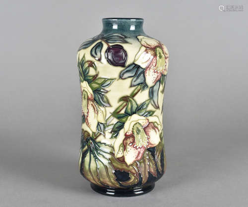 A Moorcroft pottery waisted cylindrical vase, tube-lined pattern Ashwood, Hellebore, printed and