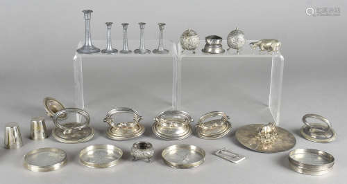 A quantity of silver and silver plated items, including bottle coasters, a white metal Indian cruet,