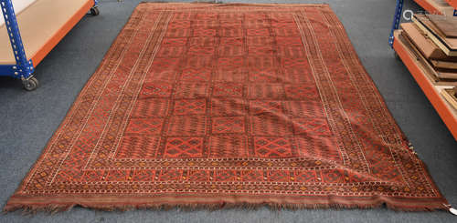 A Turkoman wool carpet, with central square all over design surrounded by multiple borders,