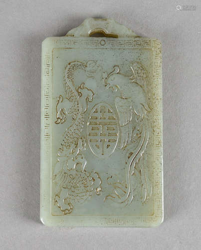 A Chinese jadeite panel, carved with dragon and phoenix, 10 cm x 6 cm