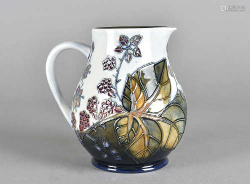 A Moorcroft pottery jug, tube-lined Bramble pattern, printed and impressed factory mark on base,