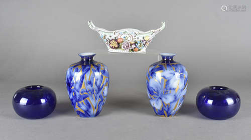 A pair of late 19th Century Staffordshire pottery blue and white ovoid vases, with floral design, 16