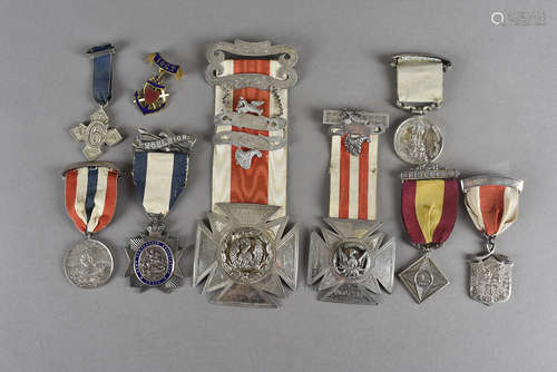 A collection of Masonic/Buffalo jewels, including three Army Temperance examples, two large silver