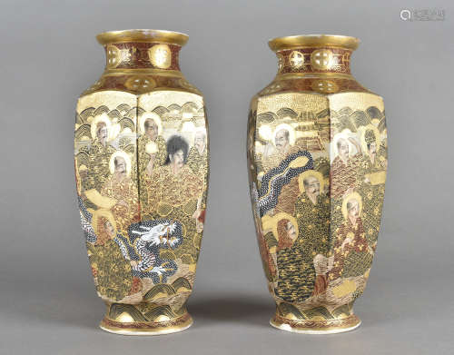 A pair of meiji period faceted vases, decorated with figures signed to base 25 cm high (af)