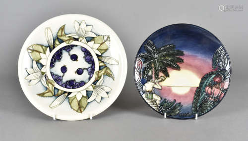 Two Moorcroft pottery commemorative year plates, tube-lined design, Birth of Light, 23 cm together