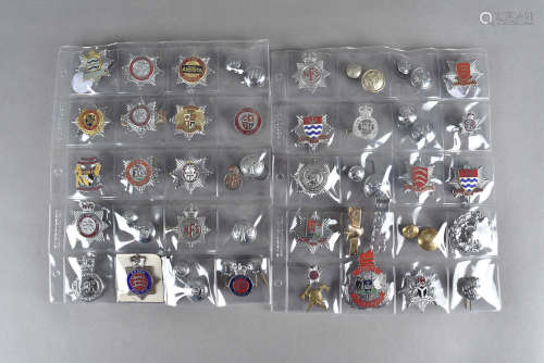 A quantity of cap badges and buttons, including London, Leicestershire, AFS, NFS, Essex Police,