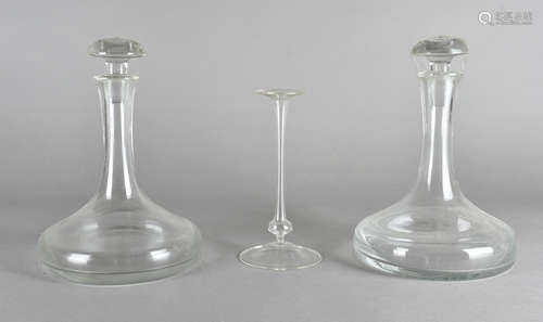 A pair of Whitefriars glass decanters, and stoppers, the colourless glass with large, wide bases