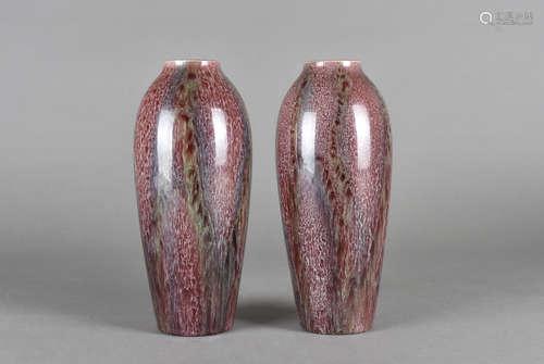 A pair of Bretby ovoid vases, in all over mottled red and green glaze, 25 cm high