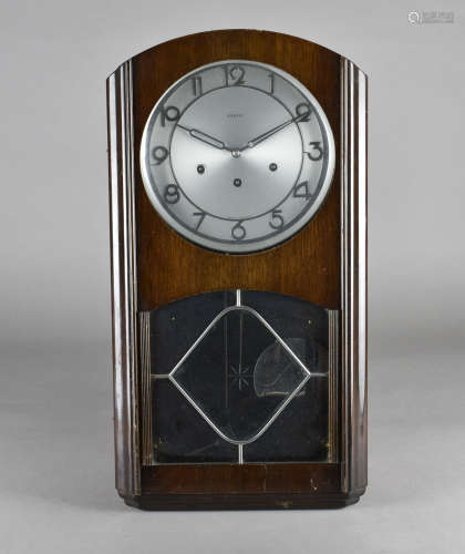 A Kienzle German chrome and walnut Art Deco wall clock, 59 cm x 33 cm x 16 cm