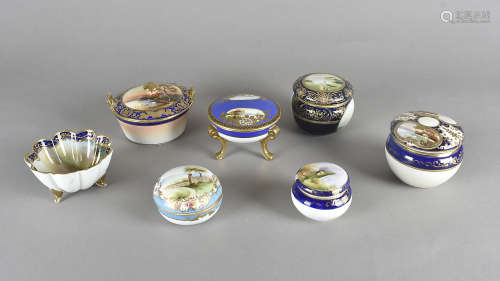 A collection of Noritake pot and covers, boxes and butter dishes, all with painted decoration,