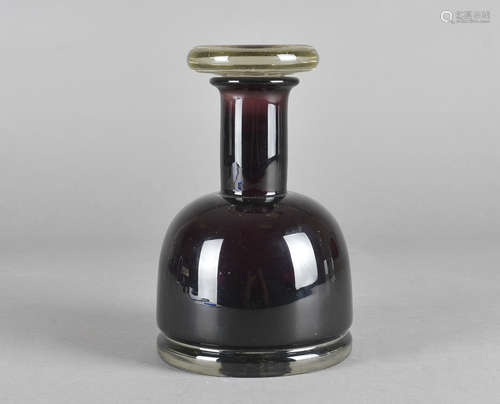 A Scandinavian hand blown amethyst decanter, with colourless stopper and base, sunken pontil with