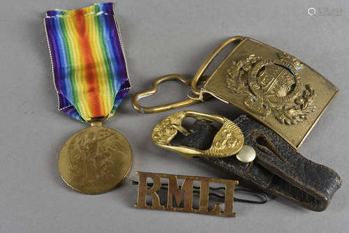 A WWI Victory medal, awarded to PO. 19741 PTE W.W.ROWE.R.M.L.I, together with a belt buckle,