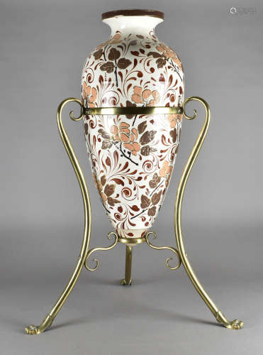 A 19th Century pottery amphora style vase, on ornate brass scroll stand with paw feet, marked to