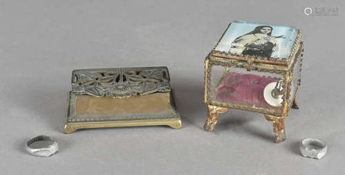 An early 20th Century trinket box, with glass sides, the top with printed picture of the Virgin