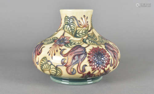 A Moorcroft pottery squat bulbous vase, tube-lined Tahiti pattern, 16.5 cm h x 22 cm d, with printed