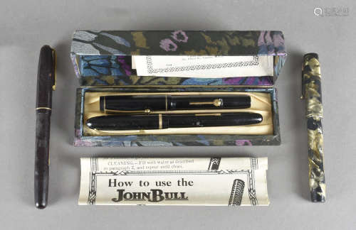 Three Watermans fountain pens, all with gold nibs, one marbled, together with a John Bull fountain
