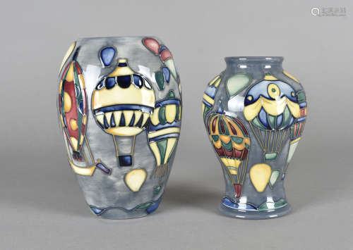 Two Moorcroft pottery ovoid vases, tube-lined Balloon pattern printed and impressed factory marks to