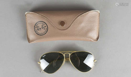 A pair of vintage aviator Ray Bans, with glass lenses and etched B and L for Bausch & Lomb in