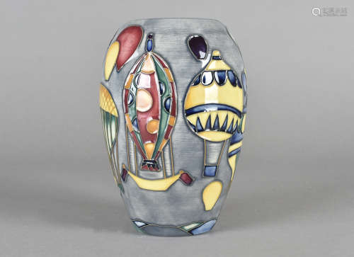 A Moorcroft ovoid pottery vase, tube-lined Balloons pattern, with printed and impressed factory