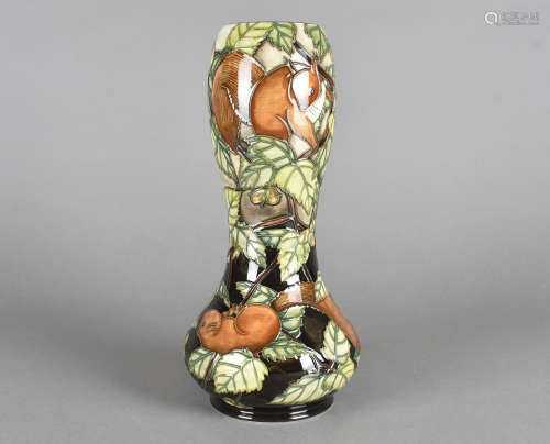 A limited edition Moorcroft pottery double gourd vase, after a design by Anji Davenport, no. 86 of