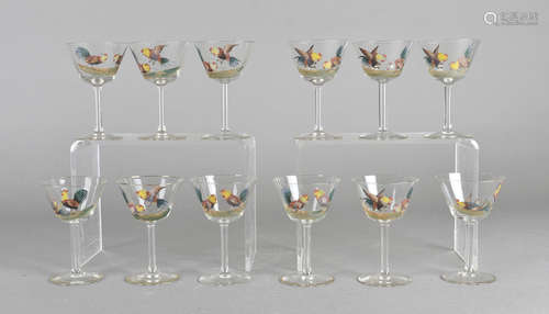 A set of twelve early 20th Century cocktail glasses, with enamel decoration of a cock fight