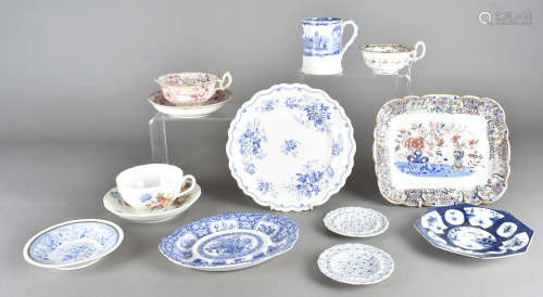 A collection of Staffordshire blue and white and polychrome ceramics, including a tall chocolate cup