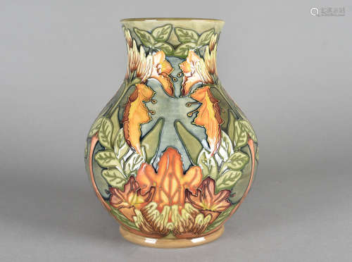A Moorcroft pottery large bulbous vase, tube-lined Flame of the Forest pattern, printed and