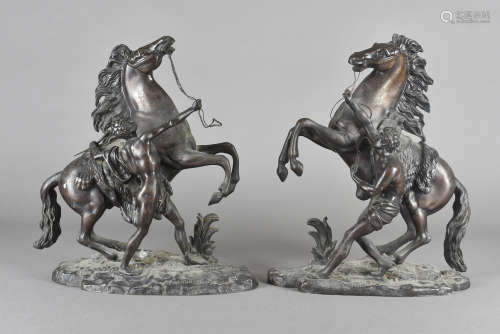 A pair of bronze marley horses, after Couston, 31 cm high
