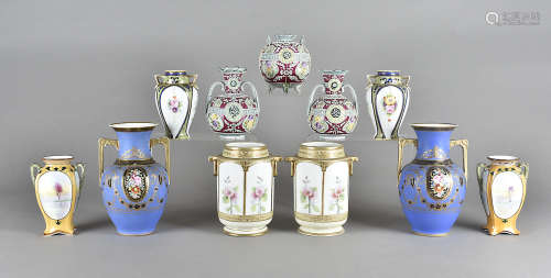 Four pairs of Noritake twin handled porcelain vases, mostly all floral decorated, one pair with