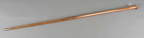 A hardwood walking stick, with clenched fist and ball, with banded collar, possibly Pit Cairne