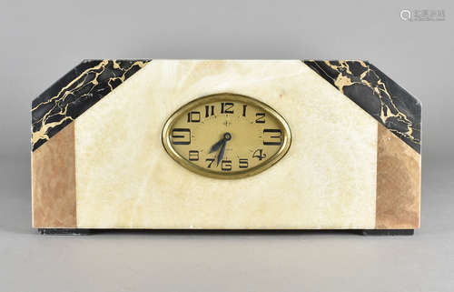 An art deco marble clock, with ovoid face and stylised arabic numerals, 45 cm wide x 21 cm high x