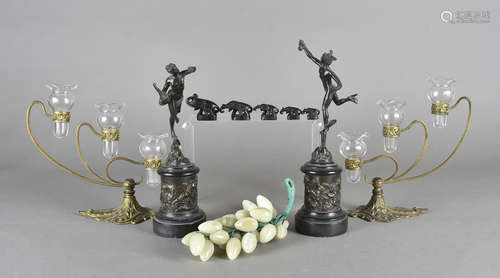 A set of five graduated interlocking bronze elephants, a pair of spelter figures, a pair of gilt