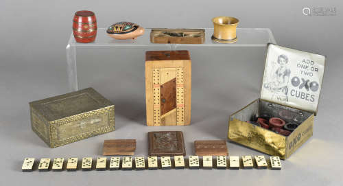 A folding cribbage board, a set of bone and ebony prisoner of war dominoes, draughts, boxwood card