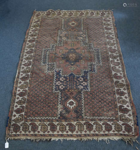 A caucasian wool rug, with central cruciform on blue and red ground, with mother and child border,