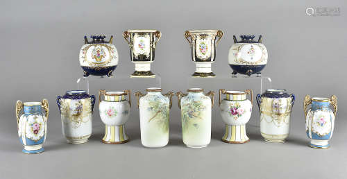 A collection of six twin handled Noritake vases, all painted with floral designs, and some